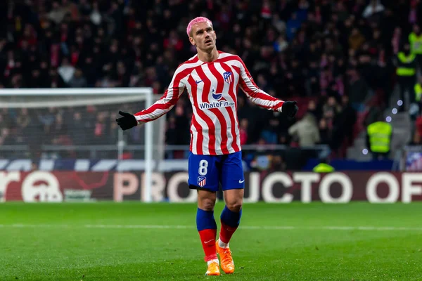 Madrid, Spain- January 21, 2023: Soccer match between Atletico de Madrid and Real Valladolid at Civitas Metropolitano. Antoine Griezman fights for the ball.
