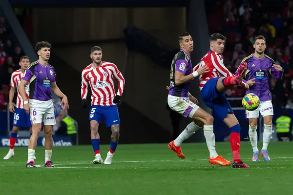 Madrid, Spain- January 21, 2023: Soccer match between Atletico de Madrid and Real Valladolid at Civitas Metropolitano. Alvaro Morata fights for a ball.