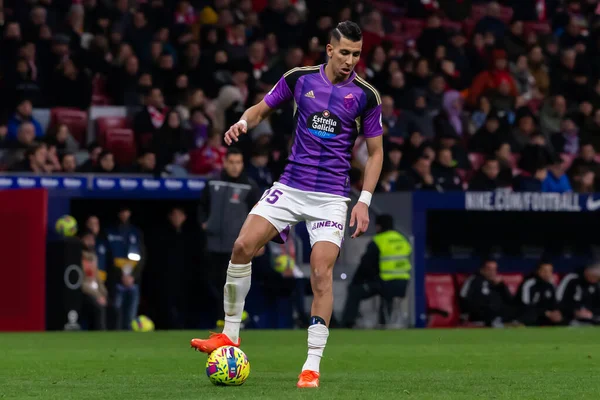 Madrid, Spain- January 21, 2023: Soccer match between Atletico de Madrid and Real Valladolid at Civitas Metropolitano. Jawad El Yamiq fights for the ball on the pitch.