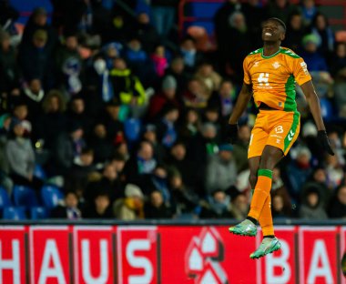 Madrid, Spain- January 28, 2023: Soccer match between Real Betis balonpie and Getafe F.C in Madrid. The Betis player Luiz Enrique jumping on the pitch.