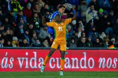 Madrid, Spain- January 28, 2023: Soccer match between Real Betis balonpie and Getafe F.C in Madrid. The Betis player Luiz Enrique jumping on the pitch.
