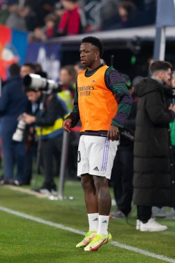 Madrid, Spain- February 18, 2023: League match between Real Madrid and Osasuna in Pamplona. Vinicius Jr. during the pre-game warm-up. Football games. Real Madrid player.