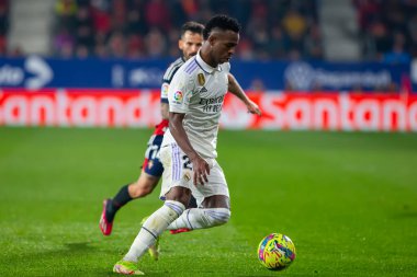 Madrid, Spain- February 18, 2023: League match between Real Madrid and Osasuna in Pamplona. Vinicius Jr. fighting for the ball. Football games. Real Madrid player.