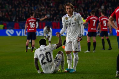 Madrid, Spain- February 18, 2023: League match between Real Madrid and Osasuna in Pamplona. Luka Modric and Vinicius Jr during the match. Football game. Real Madrid player.