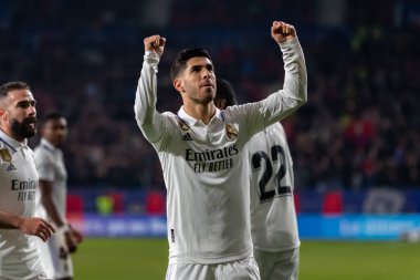 Madrid, Spain- February 18, 2023: League match between Real Madrid and Osasuna in Pamplona. Marco Asensio celebrates a goal with his teammates. Football game. Real Madrid player.