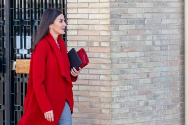 Madrid, Spain- March 3, 2023: Queen Letizia visits the UNICEF offices in Madrid for a meeting with its director. Queen Leticia greets the people waiting for her arrival at UNICEF.