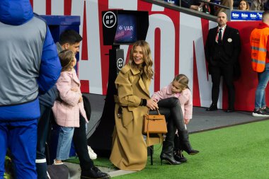 Madrid, Spain- March 4, 2023: Diego Pablo Simeone receives the support of his family on the field before the game. Simeone says goodbye to Atletico. Football coach. Match records.