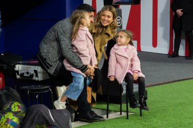Madrid, Spain- March 4, 2023: Diego Pablo Simeone receives the support of his family on the field before the game. Simeone says goodbye to Atletico. Football coach. Match records.