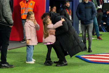 Madrid, Spain- March 4, 2023: Diego Pablo Simeone receives the support of his family on the field before the game. Simeone says goodbye to Atletico. Football coach. Match records.