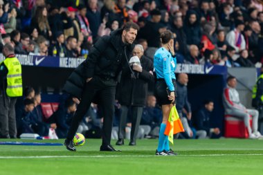 Madrid, Spain- March 4, 2023: Diego Pablo Simeone celebrates his team's goals on the pitch. Football coach.