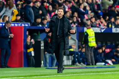 Madrid, Spain- March 4, 2023: Diego Pablo Simeone celebrates his team's goals on the pitch. Football coach.