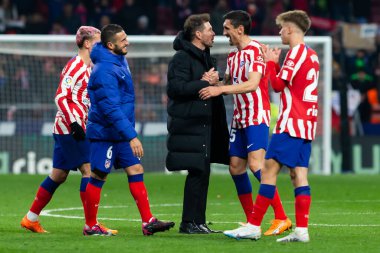 Madrid, Spain- March 4, 2023: Diego Pablo Simeone receives the support of his family on the field before the game. Simeone says goodbye to Atletico. Football coach. Match records.