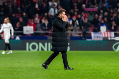 Madrid, Spain- March 4, 2023: Diego Pablo Simeone receives the support of his family on the field before the game. Simeone says goodbye to Atletico. Football coach. Match records.