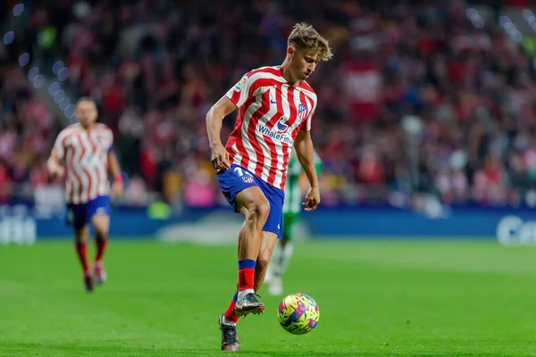 stock image Madrid, Spain- April 2, 2023: League match between Atletico de Madrid and Betis F.C. Marcos Llorente with the ball. Football player. League match.