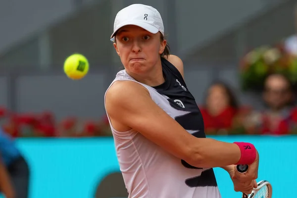 stock image Madrid, Spain- April 30, 2023: Tennis match between Iga Swiatek and Bernarda Pera at the Mutua Madrid Open in Madrid. Victory for the number 1 in women's tennis, Iga Swiatek. Women's tennis.