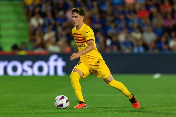 stock image Madrid, Spain- August 13, 2023: Soccer match between Getafe FC and Barcelona FC of the Spanish EA Sports league. Gavi with the ball. Football players.