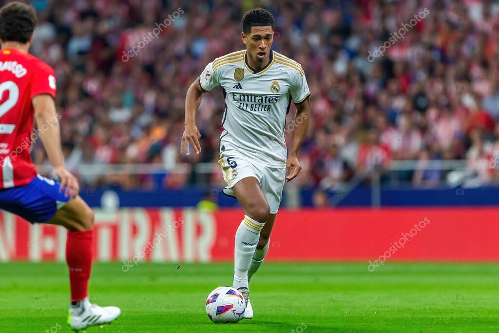 Madrid, Spain- September 24, 2023: League match between Atletico de Madrid and Real Madrid. Jude Bellingham with the ball. Football players. Victory for Atletico de Madrid.