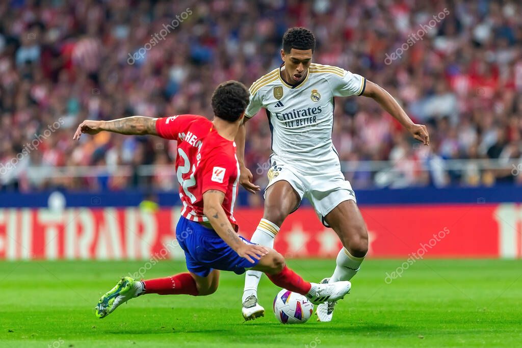 Madrid, Spain- September 24, 2023: League match between Atletico de Madrid and Real Madrid. Jude Bellingham with the ball. Football players. Victory for Atletico de Madrid.
