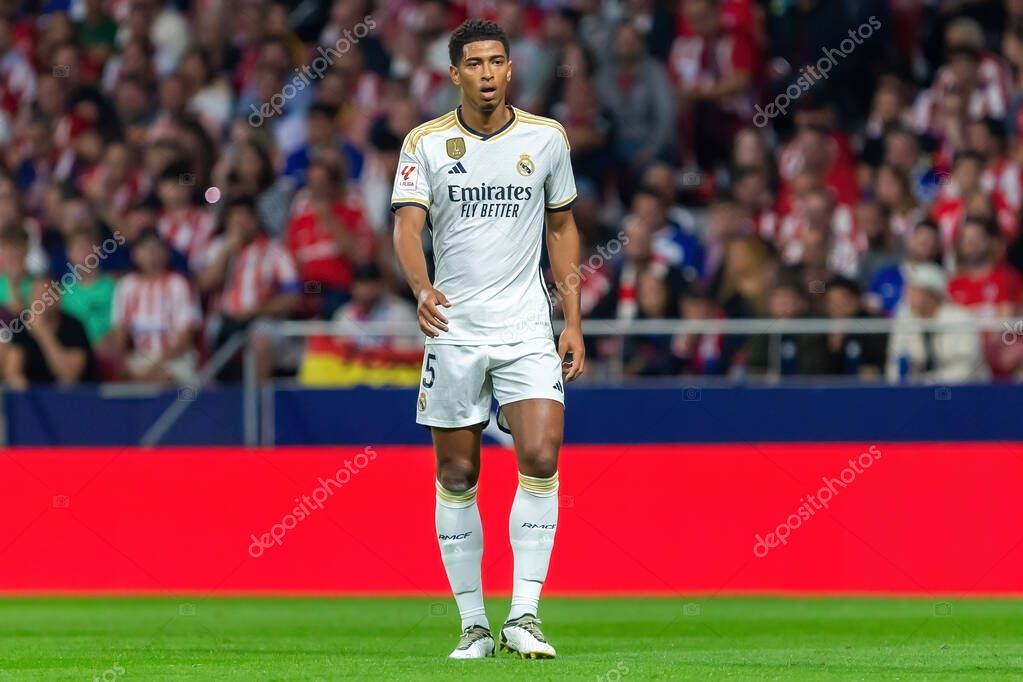 Madrid, Spain- September 24, 2023: League match between Atletico de Madrid and Real Madrid. Jude Bellingham with the ball. Football players. Victory for Atletico de Madrid.