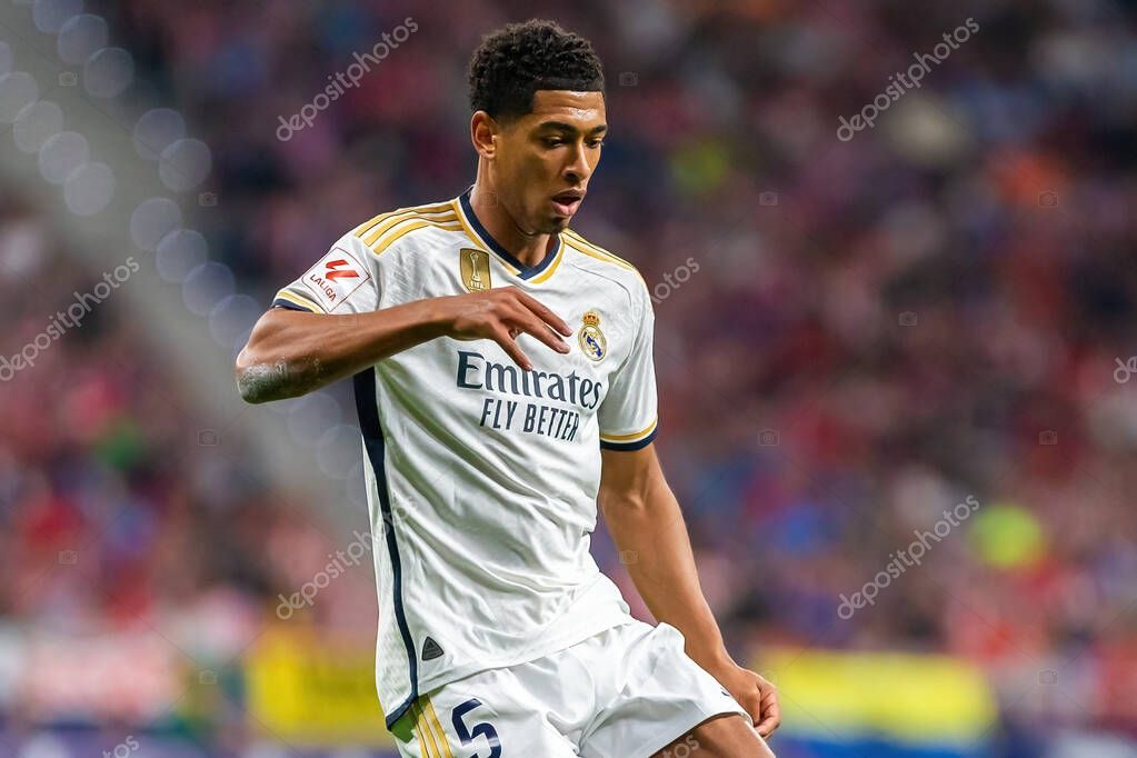 Madrid, Spain- September 24, 2023: League match between Atletico de Madrid and Real Madrid. Jude Bellingham with the ball. Football players. Victory for Atletico de Madrid.