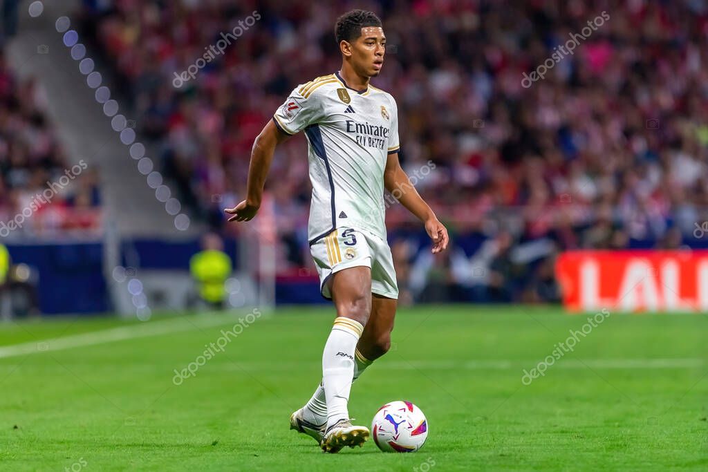 Madrid, Spain- September 24, 2023: League match between Atletico de Madrid and Real Madrid. Jude Bellingham with the ball. Football players. Victory for Atletico de Madrid.