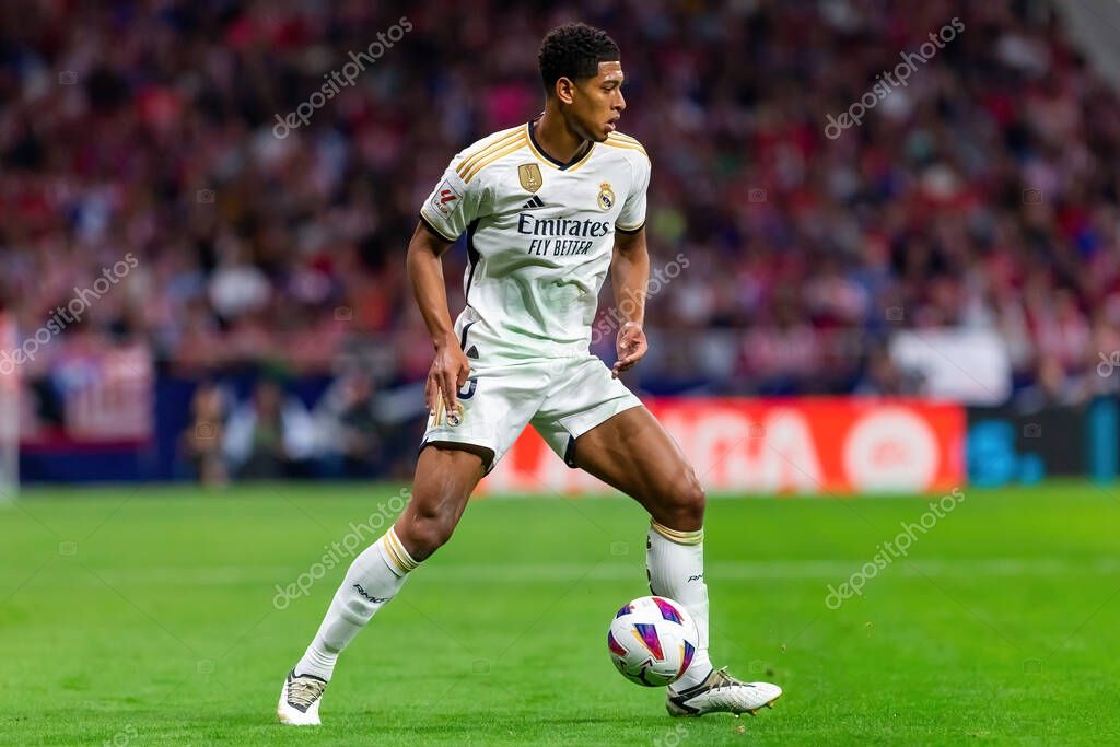 Madrid, Spain- September 24, 2023: League match between Atletico de Madrid and Real Madrid. Jude Bellingham with the ball. Football players. Victory for Atletico de Madrid.