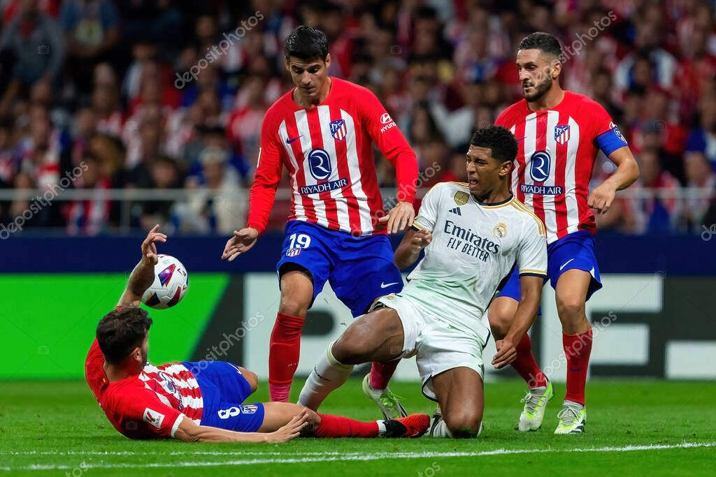 Madrid, Spain- September 24, 2023: League match between Atletico de Madrid and Real Madrid. Jude Bellingham with the ball. Football players. Victory for Atletico de Madrid.