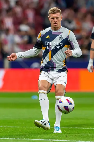 stock image Madrid, Spain- September 24, 2023: League match between Atletico de Madrid and Real Madrid. Toni Kross with the ball. Football players. Victory for Atletico de Madrid.