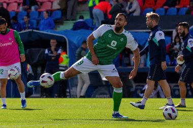 Madrid, İspanya - 21 Ekim 2023: Getafe F.C ile Betis arasındaki lig maçı Madrid 'de oynandı. Futbolcular. Topla Borja Iglesias.