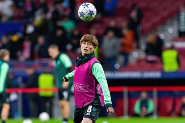 Madrid, Spain- November 7, 2023: Champions League soccer match between Atletico de Madrid and Glasgow Celtics in Madrid. Celtics players. Kygo Furuhashi with the ball.