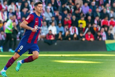 Madrid, Spain- November 25, 2023: League match between Rayo Vallecano and F.C Barcelona in Madrid. Lewandoski with the ball. Football players.
