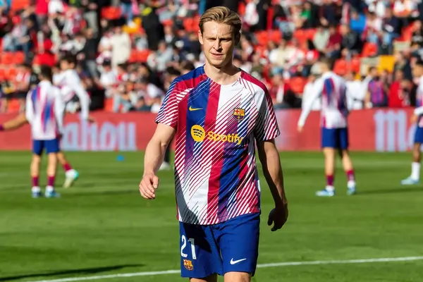 stock image Madrid, Spain- November 25, 2023: League match between Rayo Vallecano and F.C Barcelona in Madrid. De Jong with the ball. Football players.