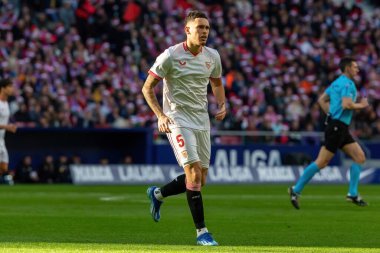 Madrid, İspanya - 23 Aralık 2023: Madrid 'de Atletico de Madrid ile Sevilla FC arasında oynanan lig maçı. Futbolcular. Toplu spor..