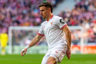 Madrid, İspanya - 23 Aralık 2023: Madrid 'de Atletico de Madrid ile Sevilla FC arasında oynanan lig maçı. Futbolcular. Toplu spor..