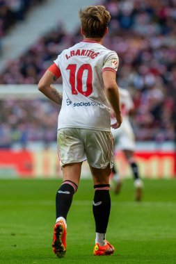 Madrid, İspanya - 23 Aralık 2023: Madrid 'de Atletico de Madrid ile Sevilla FC arasında oynanan lig maçı. Futbolcular. Toplu spor..