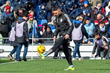 Madrid, İspanya - 11 Şubat 2024 Getafe FC ile Celta de Vigo arasındaki lig maçı. Zafer kazan. Iago Aspas topu aldı. Profesyonel futbolcular. Top için savaş..