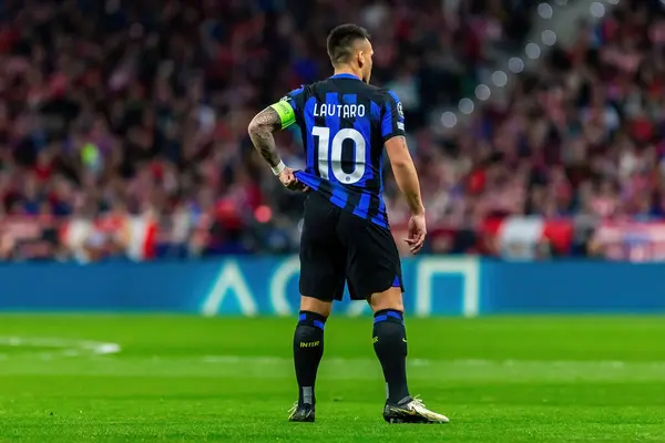 Stock image Madrid, Spain- March 13, 2024: Round of 16 match between Atletico Madrid and Inter Milan. Lautaro Martinez with the ball. Argentine player. .