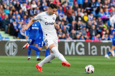 Madrid, İspanya - 16 Mart 2024: Getafe FC ile Girona FC arasında oynanan lig maçı Madrid 'de oynandı. Futbolcular. Profesyonel lig. Zafer kazanın.