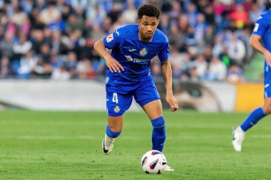 Madrid, İspanya - 16 Mart 2024: Getafe FC ile Girona FC arasında oynanan lig maçı Madrid 'de oynandı. Futbolcular. Profesyonel lig. Zafer kazanın.