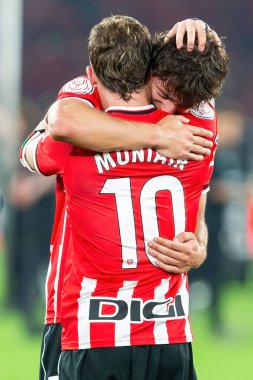 Seville, Spain- April 6, 2024: Final of the Copa del Rey soccer match between Athletic Club de Bilbao and Real Mallorca. The Athletic players celebrate the victory. clipart