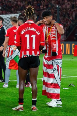Seville, Spain- April 6, 2024: Final of the Copa del Rey soccer match between Athletic Club de Bilbao and Real Mallorca. Victory for Athletic Club de Bilbao. Nico Williams soccer player. clipart