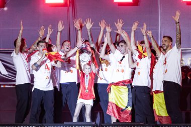 Madrid, Spain- July 15, 2024: The Spanish soccer team celebrates in the Plaza de Cibeles as champions of Euro 2024. Winners of the Euro Cup. Festival of champions. clipart