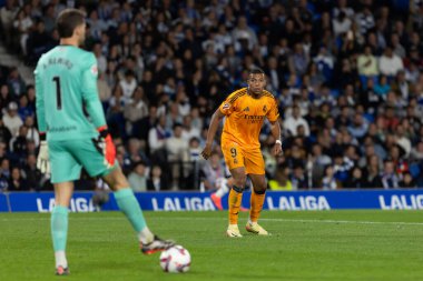 San Sebastian, Spain - September 14, 2024: League match between Real Sociedad and Real Madrid, played in San Sebastian. Kylian Mbappe with the ball. Real Madrid players. clipart