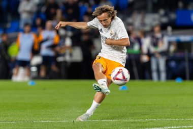 San Sebastian, Spain - September 14, 2024: League match between Real Sociedad and Real Madrid, played in San Sebastian. Luka Modric with the ball. Real Madrid players. clipart