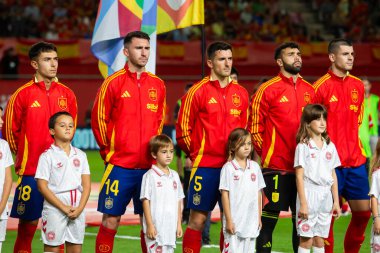 Murcia, Spain - October 12, 2024: UEFA Nations League qualifying match between the Spanish national football team and Denmark. Players of the Spanish national team. Spanish fans. clipart