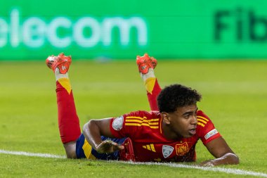 Murcia, Spain - October 12, 2024: UEFA Nations League qualifying match between the Spanish national football team and Denmark. Players of the Spanish national team. Spanish fans. clipart