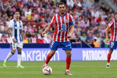 Madrid, İspanya - 20 Ekim 2024: Atletico de Madrid ve Legans f.c. Atletico oyuncuları. Legans oyuncuları. Atletico hayranları. Oyuncular bir gol kutluyor.