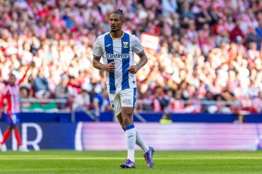 Madrid, İspanya - 20 Ekim 2024: Atletico de Madrid ve Legans f.c. Atletico oyuncuları. Legans oyuncuları. Atletico hayranları. Oyuncular bir gol kutluyor.