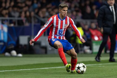 Madrid, Spain - December 11, 2024: Champions League match between Atletico de Madrid and SK Slovamn Bratislava played in Madrid. Atletico de Madrid players. Colchoneros win clipart