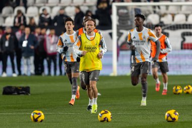 Madrid, Spain - December 14, 2024: League match between Rayo Vallecano and Real Madrid played in the Vallecas neighborhood. Soccer players. league 2024, league 2025. clipart